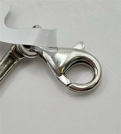 9ct white gold bracelet, 19cm length, 6.4g weight, unbranded jewelry with a sleek design on a plain background.