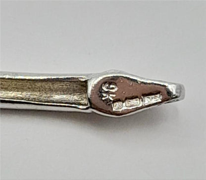 9ct white gold bracelet, 19cm length, 6.4g, shiny unbranded jewelry with intricate design visible in the image.