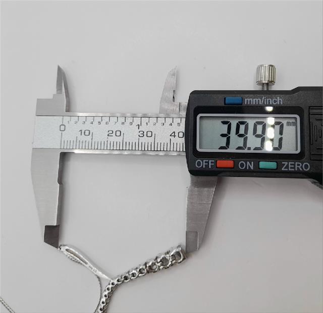 9ct white gold chain, 17 inches long, 5.1g, unbranded, showcasing a sleek, polished design for elegant wear.