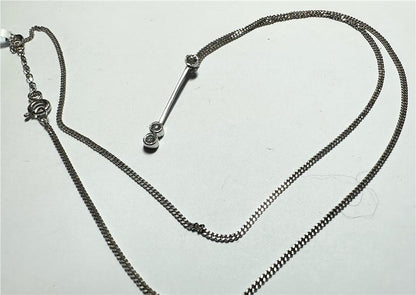 9ct white gold chain with an 18ct white gold diamond pendant, weighing 3.5g, elegant jewelry piece with sparkling diamonds.