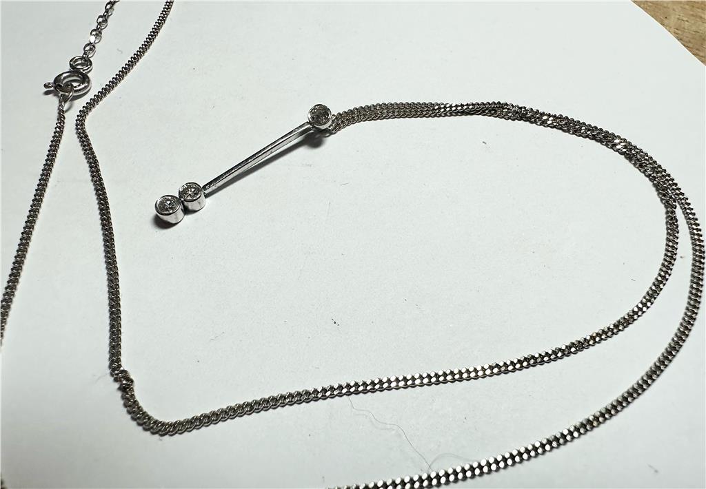 9ct white gold chain with 18ct white gold diamond pendant, weight 3.5g, elegant jewelry piece with sparkling diamonds.