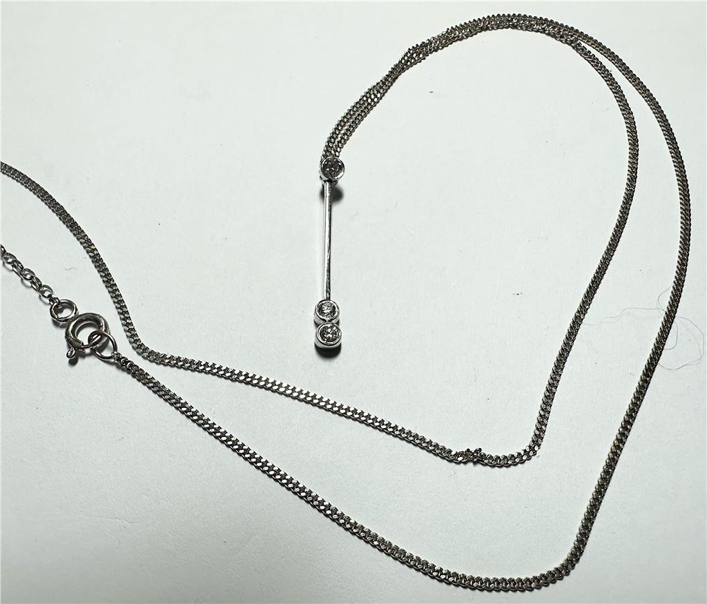 9ct white gold chain with 18ct white gold diamond pendant, weight 3.5g, showcasing elegant jewelry craftsmanship.