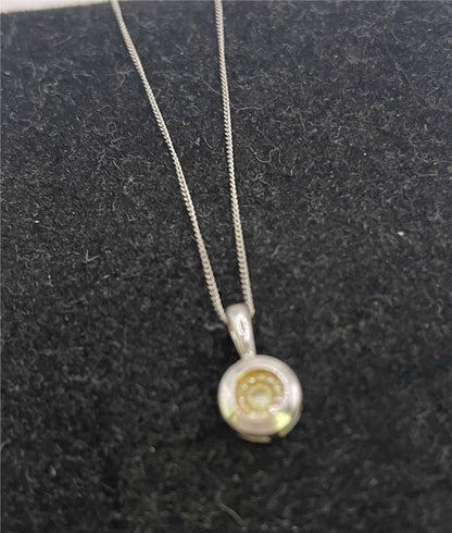 9ct white gold chain and pendant featuring a sleek design, perfect for elegant jewelry wear.