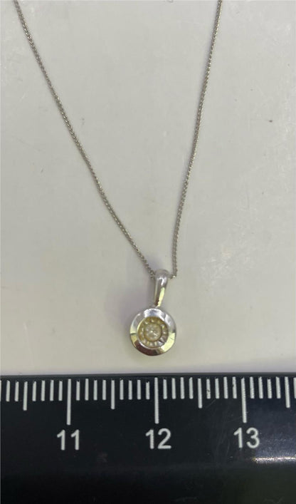 9ct white gold chain with matching pendant, elegant jewelry piece, showcasing a delicate, polished design.