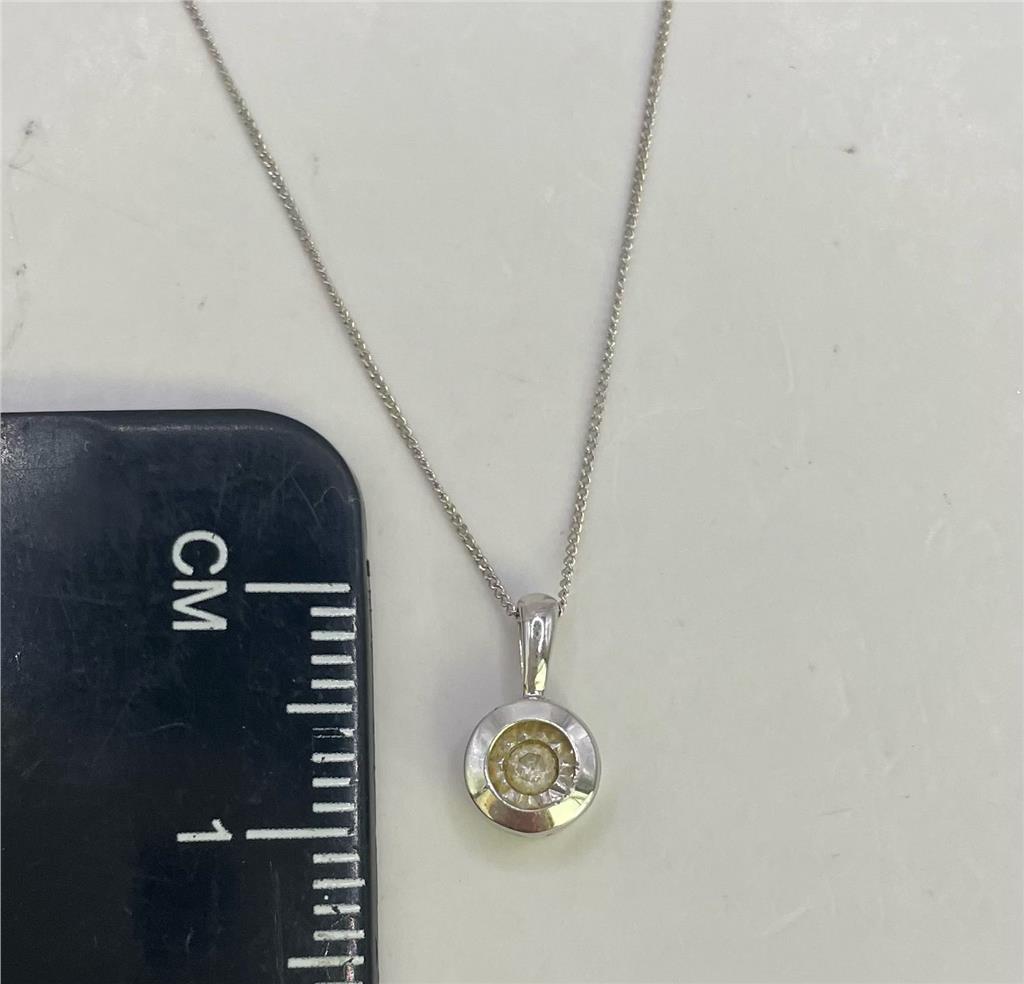 9ct white gold chain with matching pendant, featuring a sleek and elegant design, perfect for everyday or special occasions.