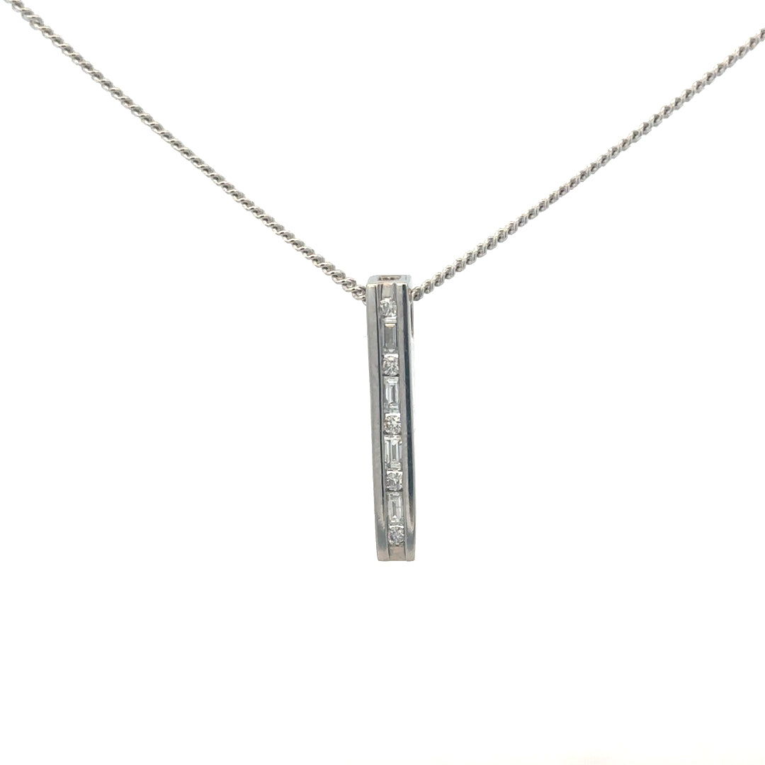 9ct white gold chain with 18ct diamond pendant featuring 0.25 carats, showcasing a sparkling diamond and elegant gold chain.