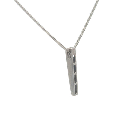 9ct white gold chain with an 18ct 0.25 carat diamond pendant, showcasing elegant jewelry design and sparkling gemstone detail.