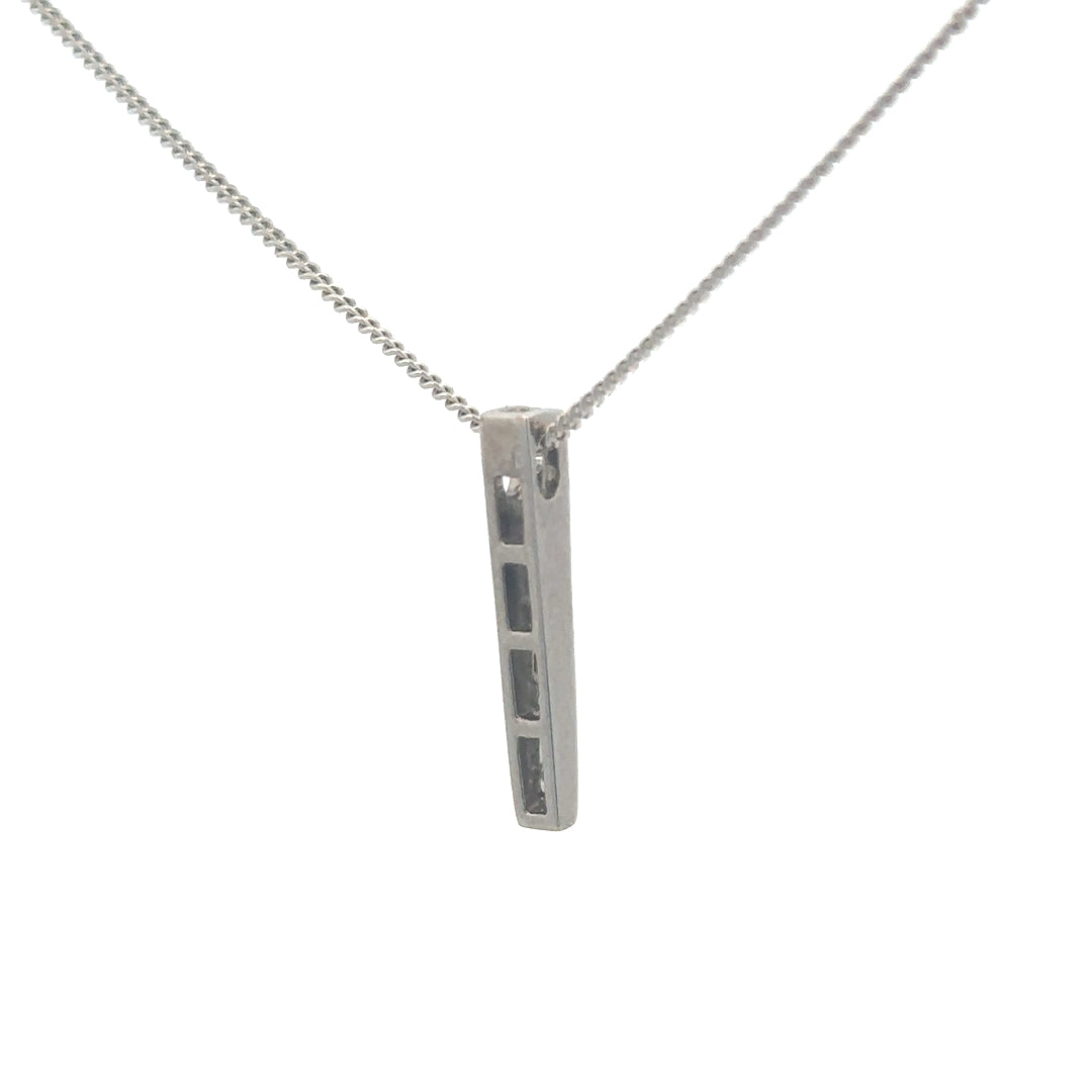 9ct white gold chain with an 18ct gold diamond pendant featuring 0.25 carats of sparkling diamonds.