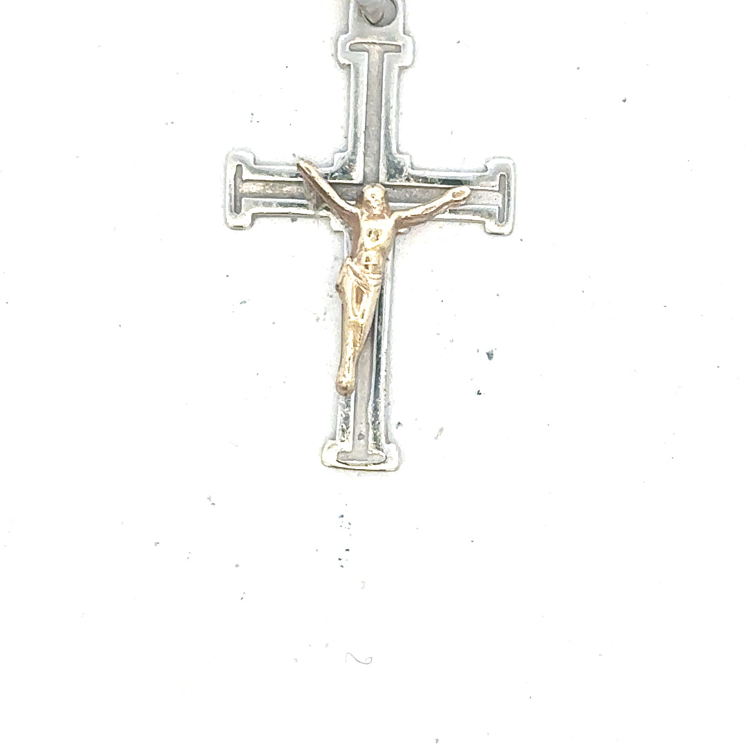 9ct white gold cross pendant weighing 1.7g, featuring a simple and elegant design, displayed against a neutral background