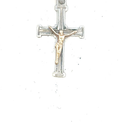 9ct white gold cross pendant weighing 1.7g, featuring a simple and elegant design, displayed against a neutral background