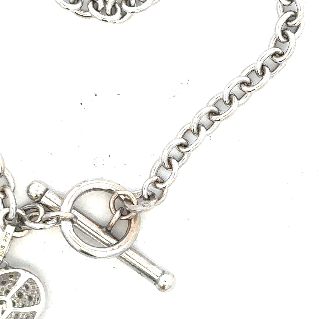 9ct white gold diamond bracelet with delicate design, weighing 5.4g, featuring sparkling diamonds on a fine chain.