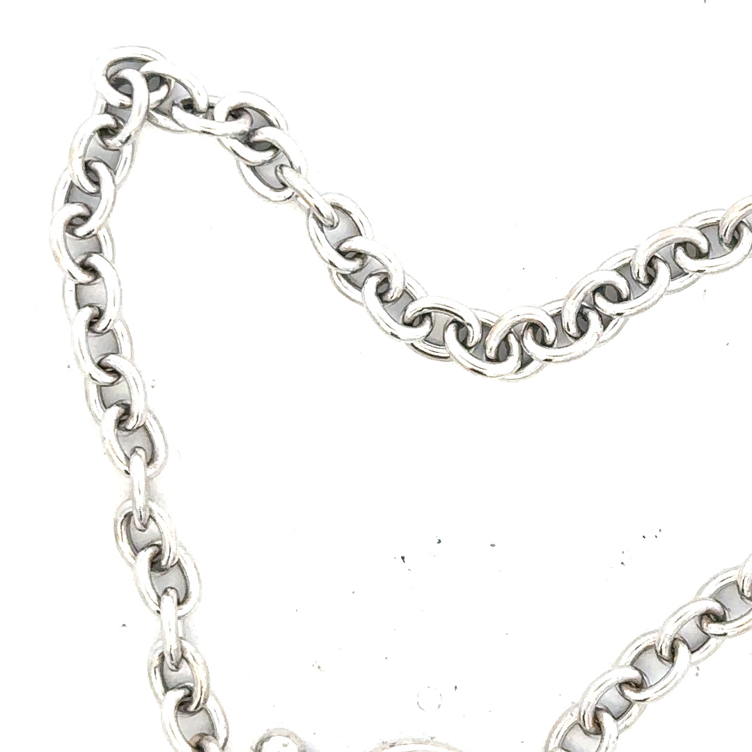 9ct white gold diamond bracelet with sparkling diamonds, weighing 5.4g, featuring a delicate design and secure clasp.