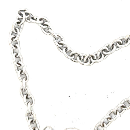 9ct white gold diamond bracelet with sparkling diamonds, weighing 5.4g, featuring a delicate design and secure clasp.