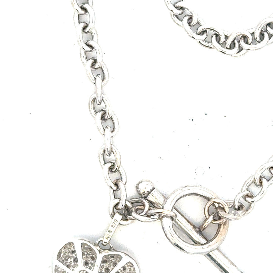 9ct white gold diamond bracelet with sparkling diamonds, weighing 5.4 grams, showcasing a delicate and elegant design.