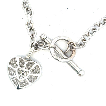 9ct white gold diamond bracelet with delicate design, showcasing sparkling diamonds and a secure clasp.