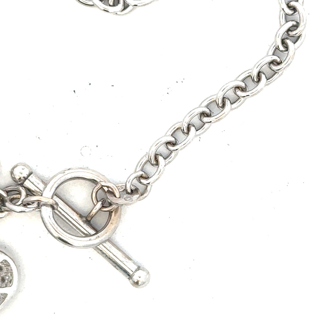 9ct white gold diamond bracelet with sparkling diamonds, weighs 5.4g, featuring a delicate and elegant design.