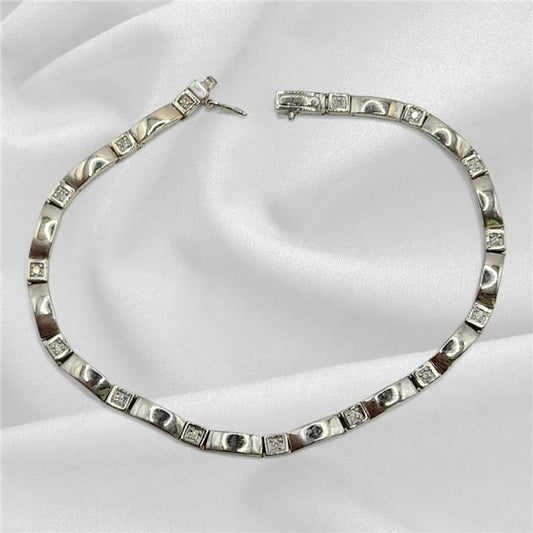 9ct white gold diamond bracelet with delicate design, weighs 8.6g, 8-inch length, featuring sparkling diamonds.