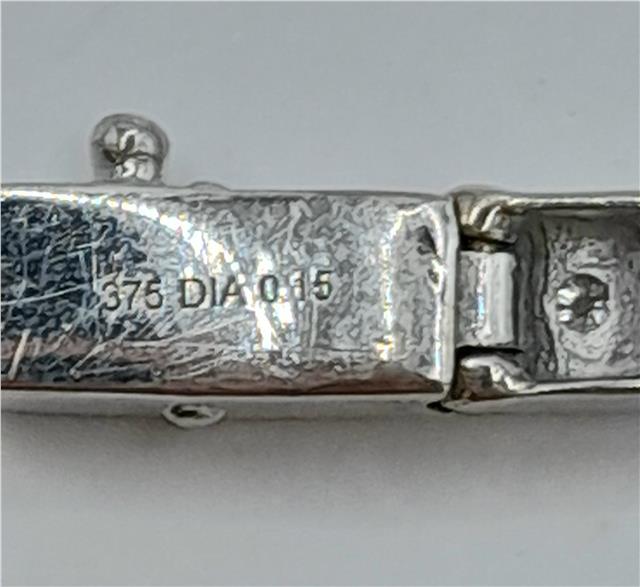 9ct white gold diamond bracelet with delicate design, 8 inches long, featuring sparkling diamonds and a secure clasp.