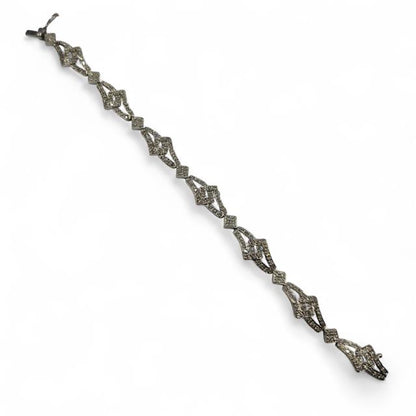 9ct white gold diamond bracelet featuring sparkling diamonds on a sleek, elegant design.