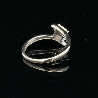 9ct white gold diamond cluster ring with a 10-point sparkling diamond, showcasing elegant jewelry craftsmanship.