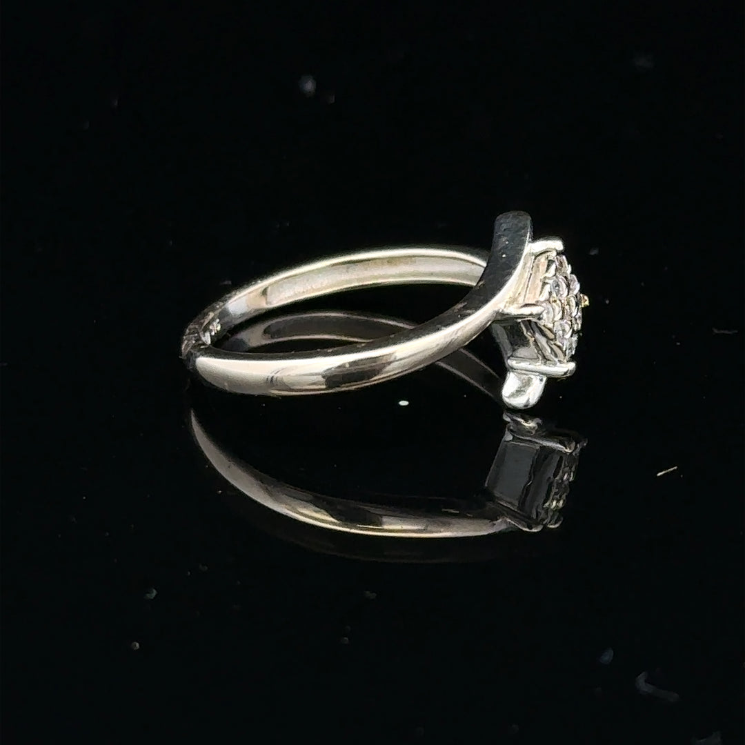 9ct white gold diamond cluster ring with a 10-point sparkling diamond, showcasing elegant craftsmanship and timeless style.