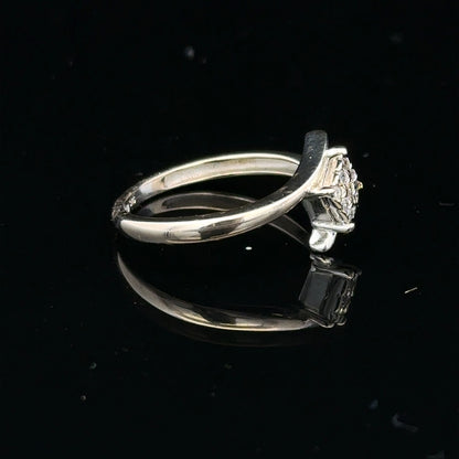 9ct white gold diamond cluster ring with a 10-point sparkling diamond, showcasing elegant craftsmanship and timeless style.
