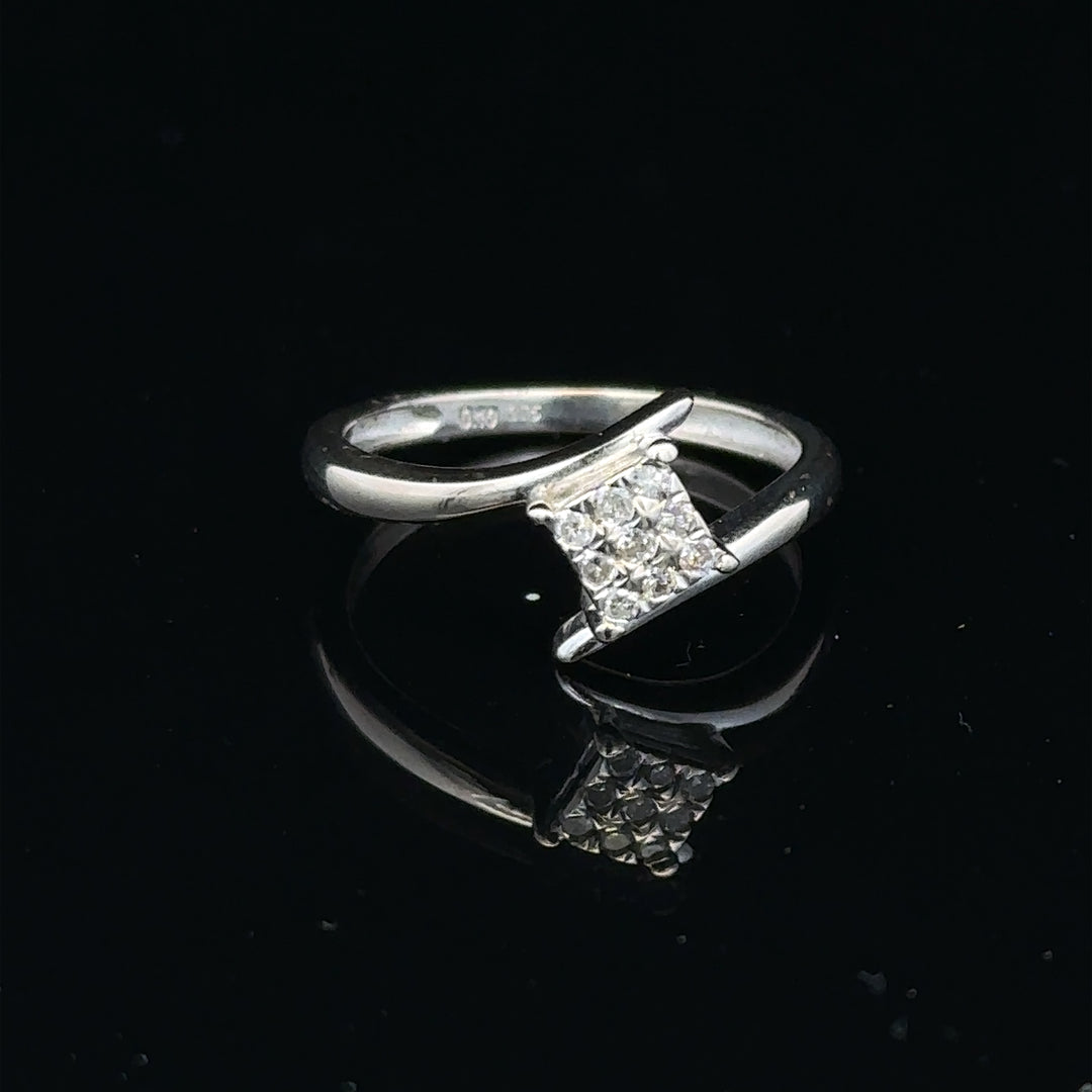 9ct white gold diamond cluster ring with a 10-point diamond, elegant jewelry featuring sparkling gemstone accents.