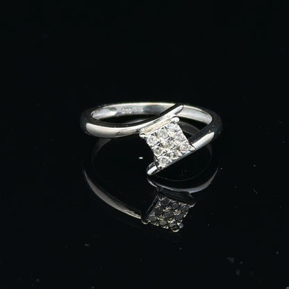 9ct white gold diamond cluster ring with a 10-point diamond, elegant jewelry featuring sparkling gemstone accents.