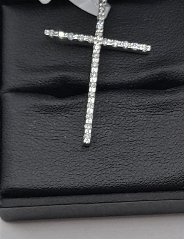 9ct white gold diamond cross pendant, unbranded, with sparkling diamonds, weighing 2.1g, shown close-up on a plain background.
