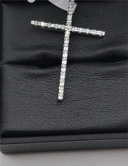 9ct white gold diamond cross pendant, unbranded, with sparkling diamonds, weighing 2.1g, shown close-up on a plain background.