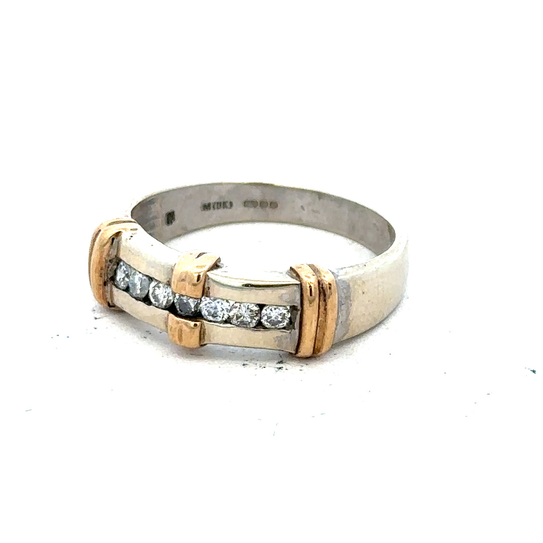 9ct white gold diamond ring with sparkling diamonds and a sleek band, showcasing elegant jewelry craftsmanship.