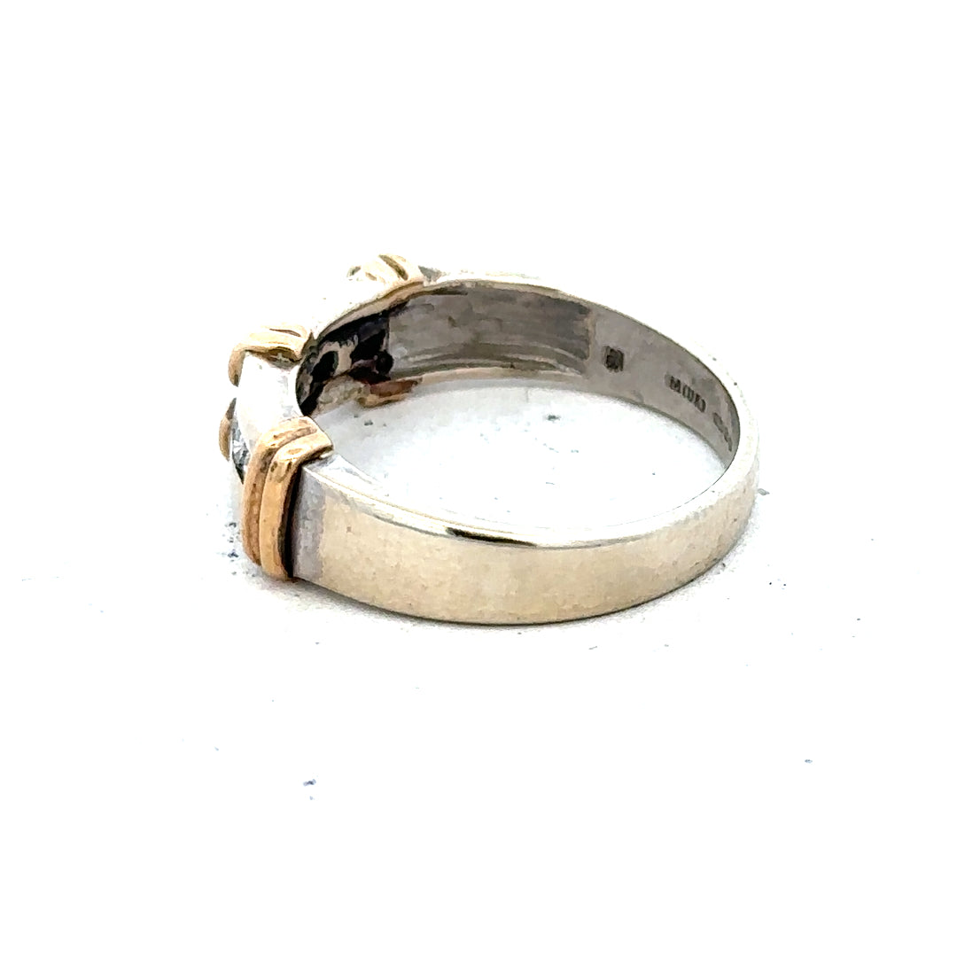 9ct white gold diamond ring featuring a sparkling central diamond and elegant band design.