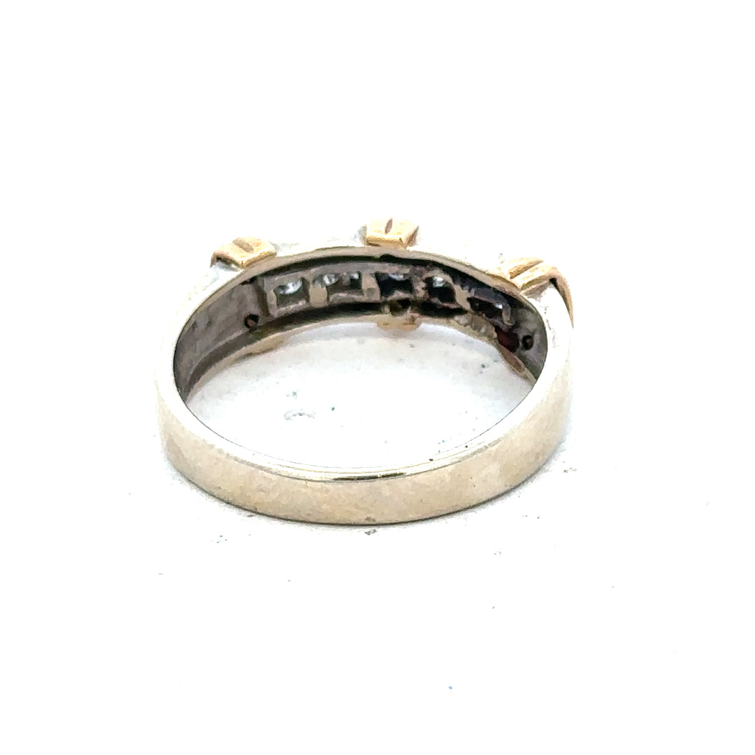9ct white gold diamond ring featuring a central sparkling diamond and a sleek band design.