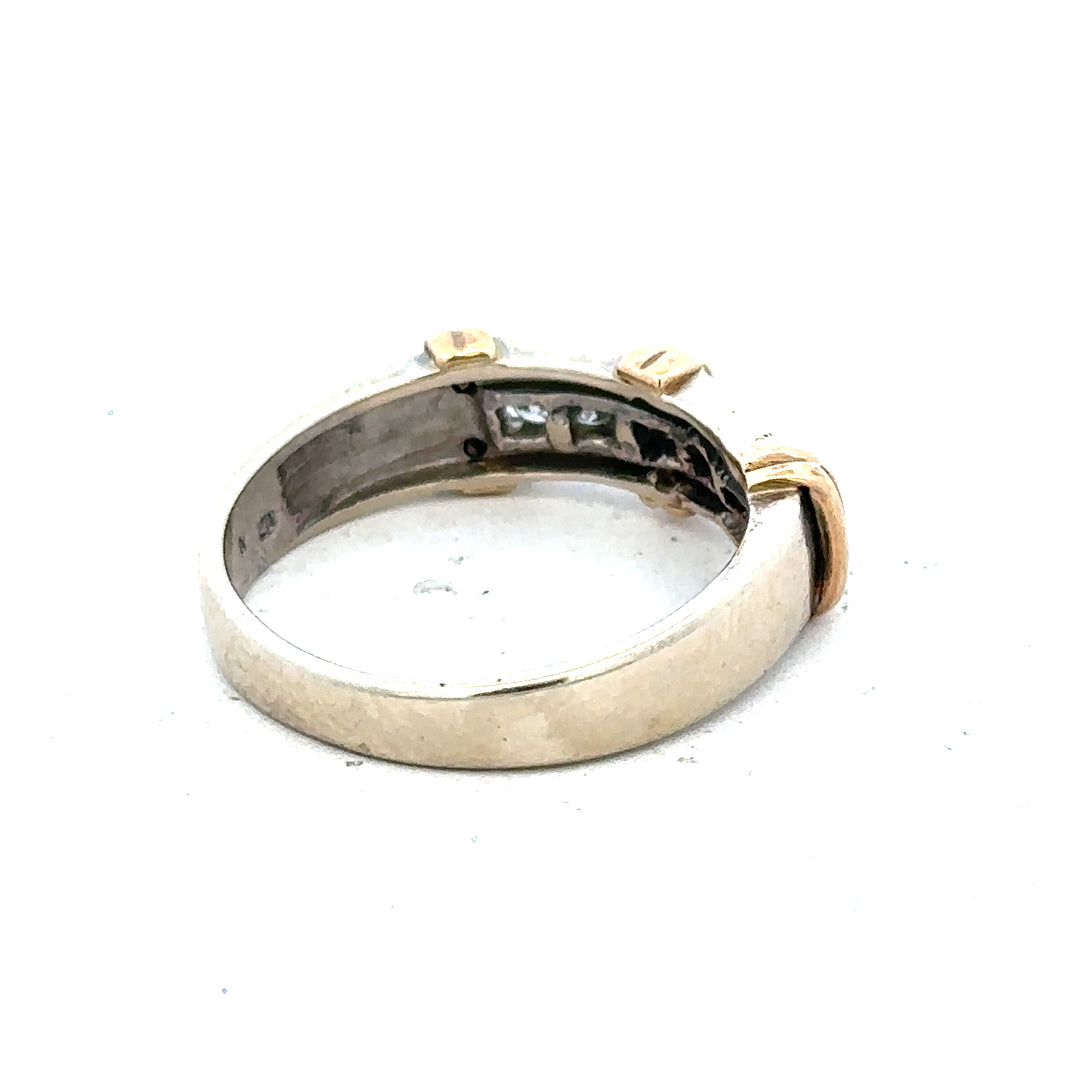 9ct white gold diamond ring with a central sparkling diamond and elegant band, unbranded jewelry piece.