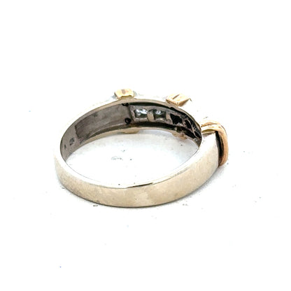 9ct white gold diamond ring with a central sparkling diamond and elegant band, unbranded jewelry piece.