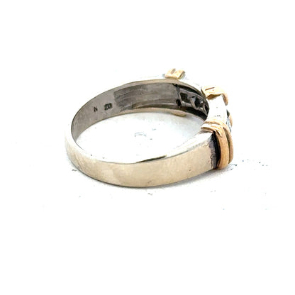 9ct white gold diamond ring with a central sparkling diamond and elegant band, showcasing fine jewelry craftsmanship.