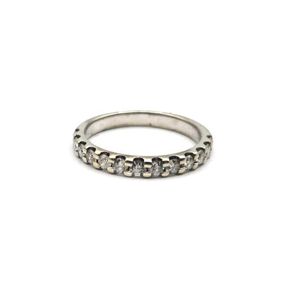 9ct white gold diamond ring with a central sparkling diamond, showcasing elegant craftsmanship and classic design.