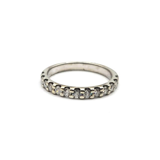9ct white gold diamond ring with a central sparkling diamond, showcasing elegant craftsmanship and classic design.