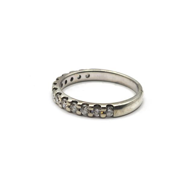 9ct white gold diamond ring with sparkling diamonds, showcasing elegant design and fine craftsmanship.