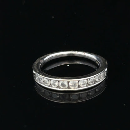 9ct white gold diamond ring in size J with sparkling diamonds, elegant jewelry piece with a sleek band and intricate design.