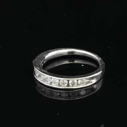 9ct white gold diamond ring in size J with a sparkling central diamond and elegant band design