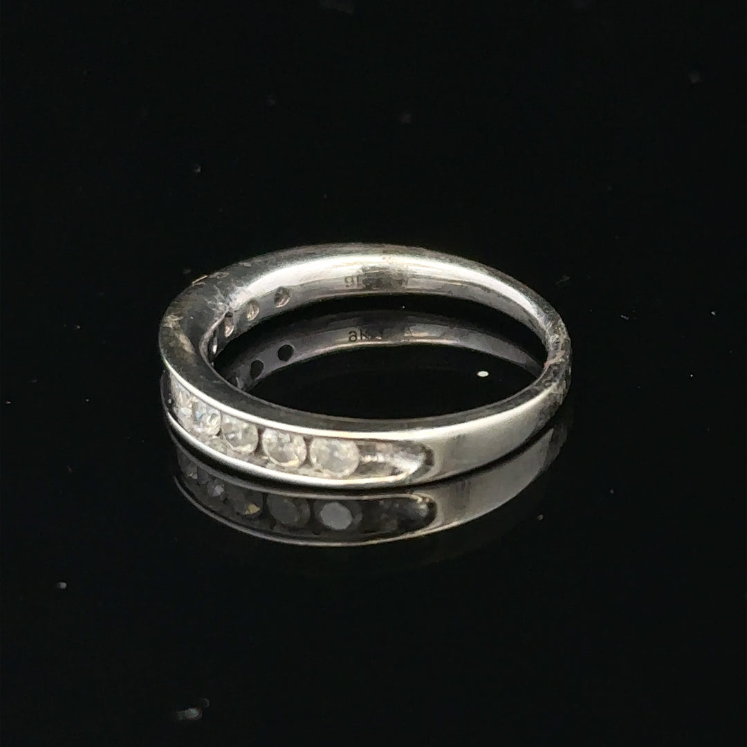9ct white gold diamond ring in size J with sparkling diamonds, showcasing elegant craftsmanship and classic design.