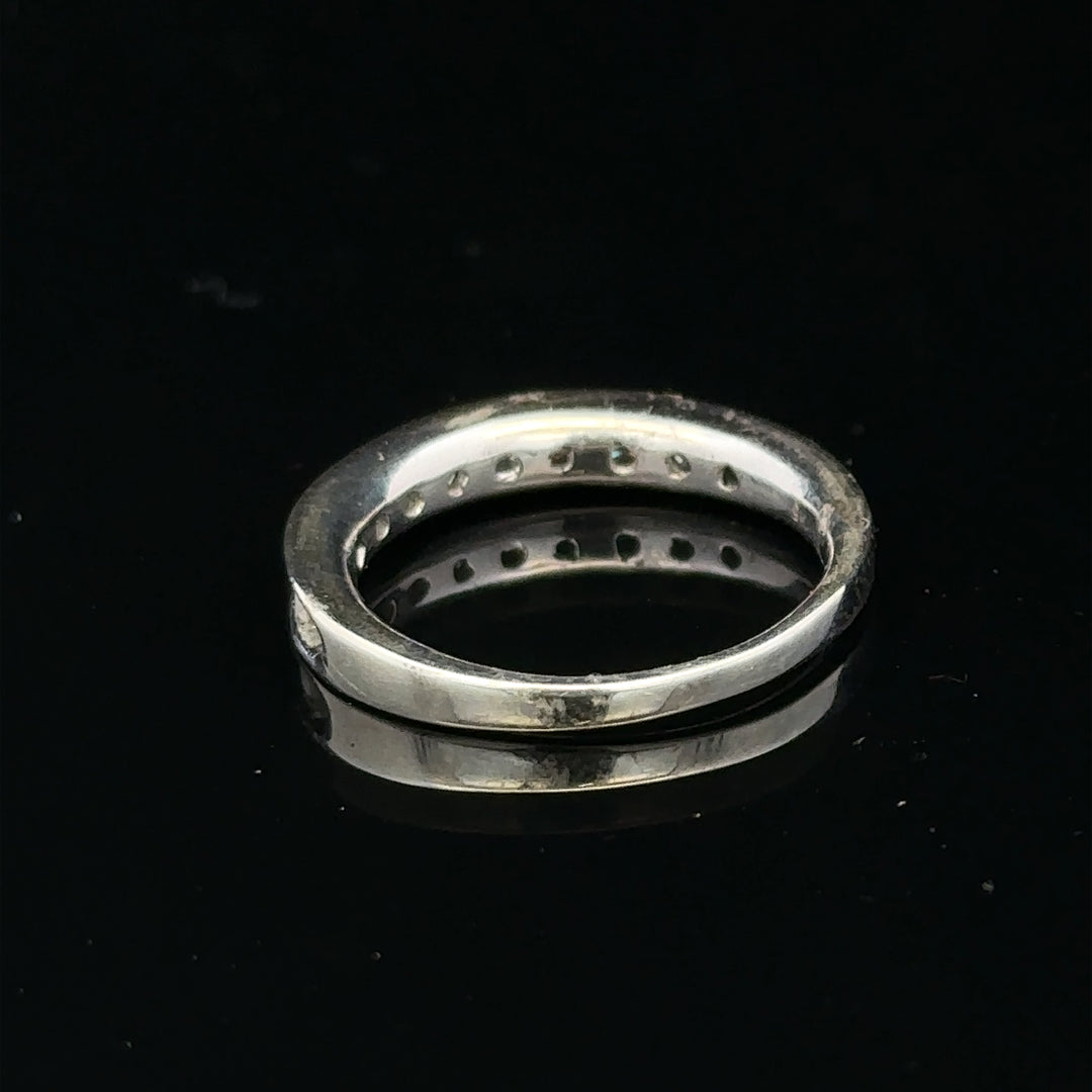 9ct white gold diamond ring in size J with sparkling diamonds, elegant jewelry piece, unbranded.