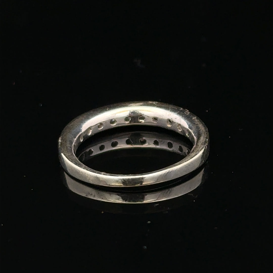 9ct white gold diamond ring in size J featuring a sparkling central diamond and elegant band design.