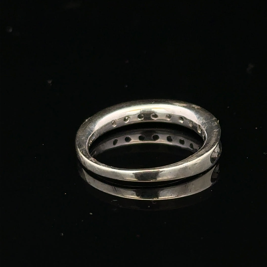 9ct white gold diamond ring in size J, featuring a sparkling diamond centerpiece and elegant band design.