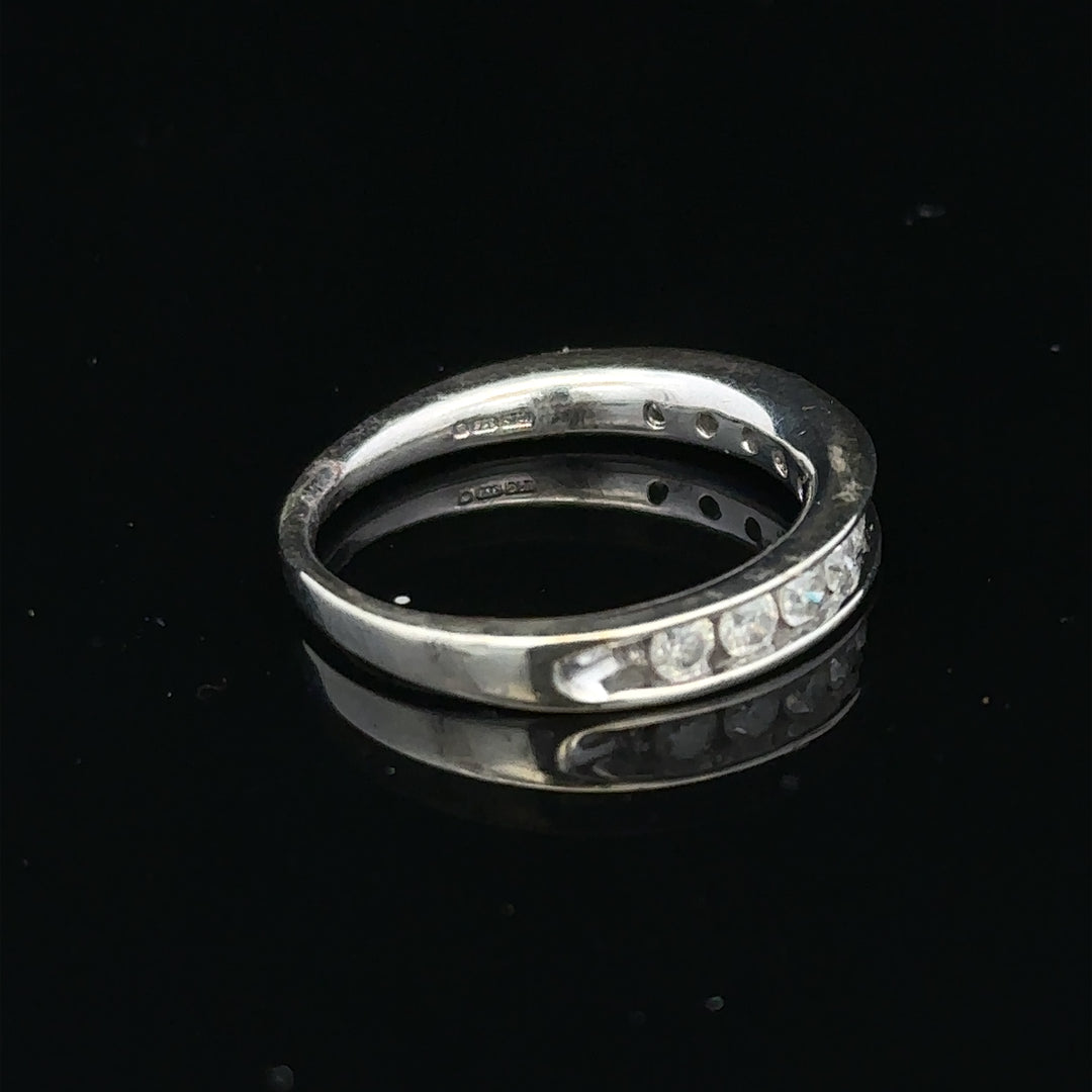 9ct white gold diamond ring in size J with a sparkling central diamond and elegant band, unbranded jewelry.