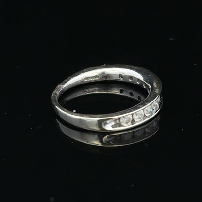 9ct white gold diamond ring in size J with a sparkling central diamond and elegant band, unbranded jewelry.