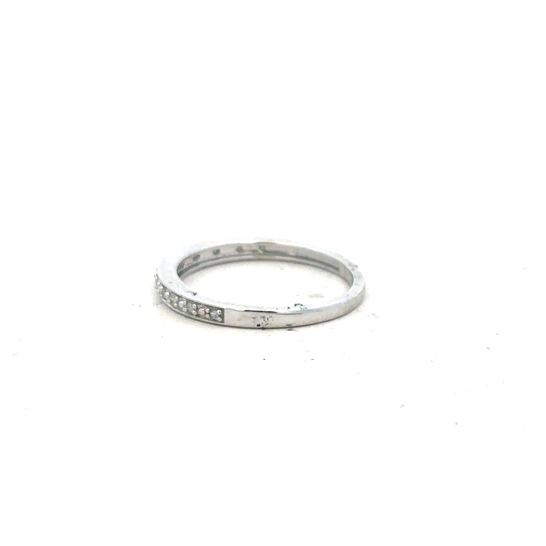 9ct white gold diamond ring size J1/2 with sparkling diamonds, showcasing elegant jewelry design and craftsmanship.