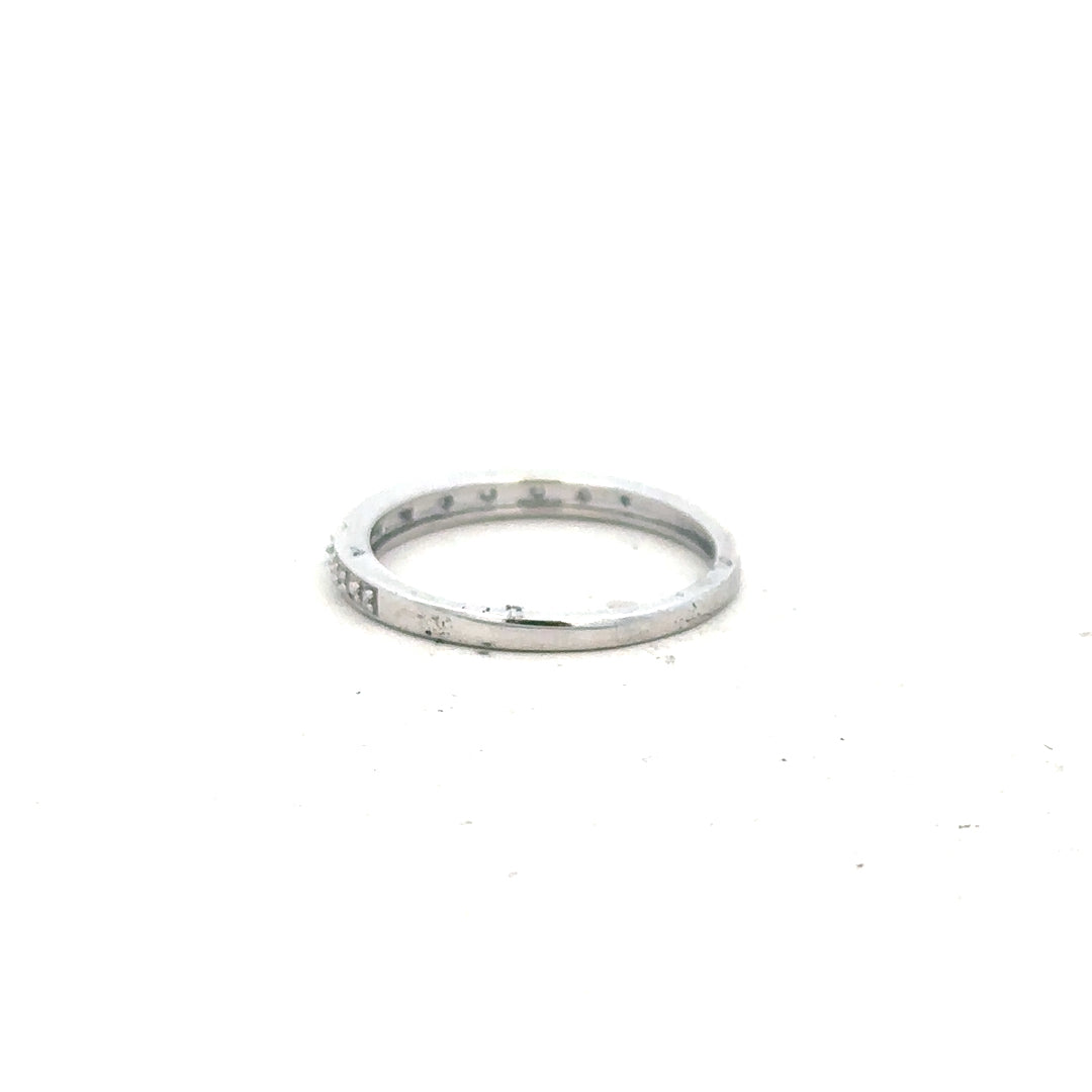 9ct white gold diamond ring size J1/2 with sparkling diamonds, showcasing elegant craftsmanship and a polished finish.