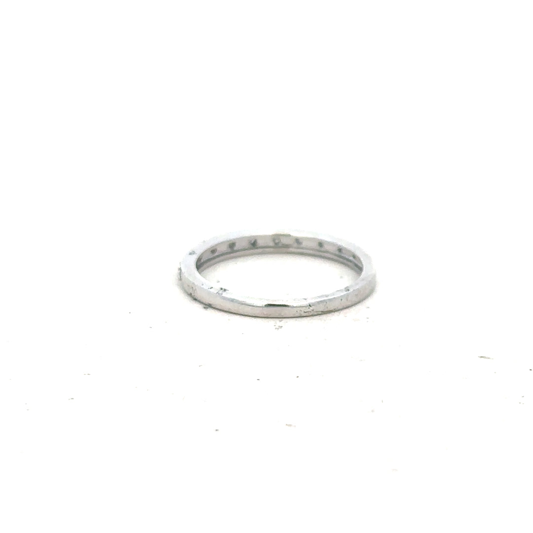 9ct white gold diamond ring size J1/2 with sparkling diamonds, showcasing elegant craftsmanship and a sleek design.